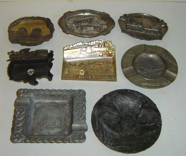 8 Vintage Train Souvenir Ashtrays & Trays: 8 Vintage Train Souvenir Ashtrays & Trays 1: The Golden Isles Of Georgia. 2: San Fransisco cable car Parrell Jones & Hybee street 3: Ghost town Calico R.R. Knott's Berry Farm, Buena Park, California 4