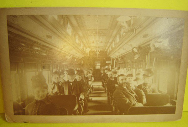 Interior Train Coach ,People Mt. Washington 1861: Interior Of Train Coach With People Mt. Washington 1861. Bemis station in the car. Sept. 1891 Mt. Washington N.H. 4 1/2 x 7 1/2. Matted measures 5 1/2 x 8 1/2.