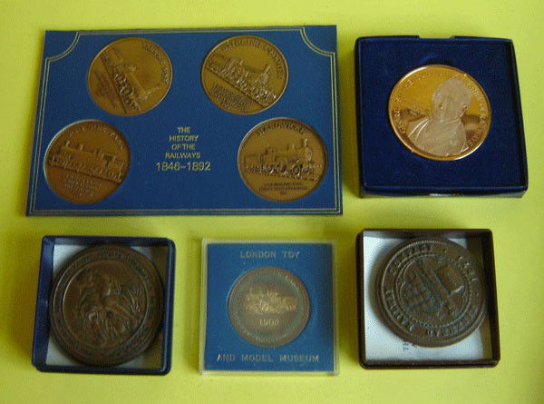 Lot Of 9 Vintage Railroad Medals And Coins: Lot Of 9 Vintage Railroad Medals And Coins 1: The seal of the valley railway company incorporated. 2: Minehead Railway company 1871. 3:(2) lady of the lake 1902 carette: Bassett - Lowke 4: George Step