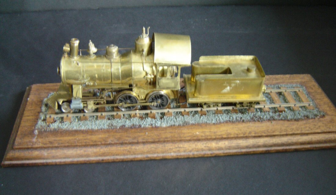 Handmade Brass Plated Locomotive and Tender Model: Engine and tender measures 7 1/2 x 1 1/2. The gauge measures 7/8 tender alone measures 3 inches the engine itself measures 5.