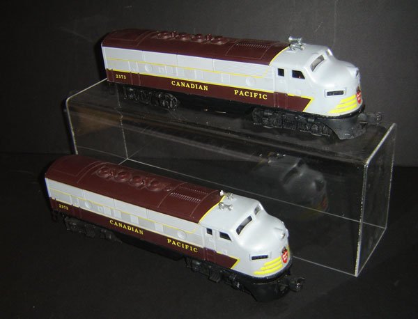 2 Rare 1957 Lionel Canadian Pacific No 2373 Engine: 2 Rare 1957 Lionel Canadian Pacific No 2373 Engines These are authentic trains, not reproductions. they have the two original boxes and the wrapping paper. They were hardly used and in great condition