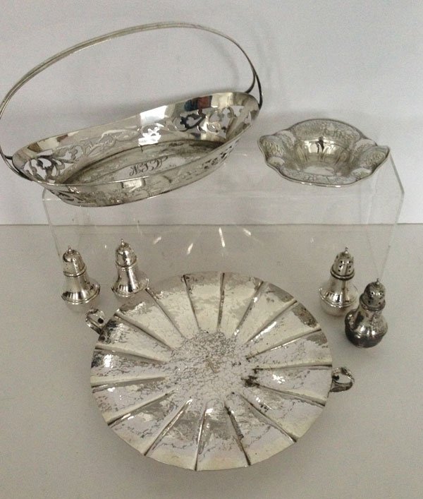 66 Lot Of Sterling Silver And Silver Plate ( Pairpoint): the silver plate basket measures 1 1/2 x 8 1/2 inches , the silver plate tray marked Pairpoint measures 10 1/4 in diameter , the 4 Lenox sterling shakers measure 4 inches in length and gross 7.46 ozt.