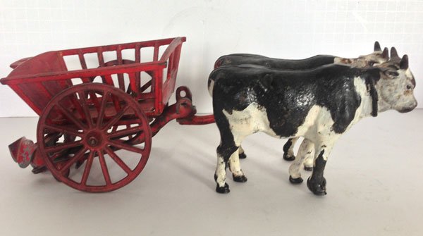 Antique Cast Iron Hay Wagon: It measures 11 1/2(L) inches.