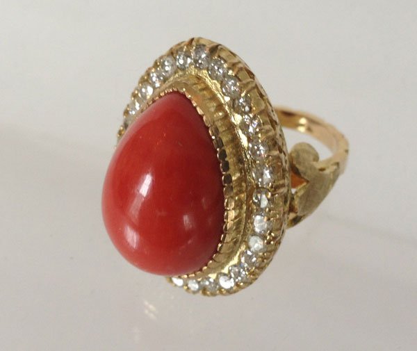 Asian Style Vintage 14K Gold Coral And Diamond Ring: 1 1/2- 2 CT in diamonds. The ring is a size 7. The total gross weight is 15.2 DWT