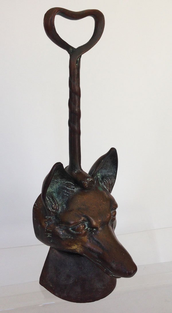 Antique Bronze And Iron Fox Doorstop: The doorstop measures approx. 14 1/4(H) x 4(L)x 3 1/2(D) inches.