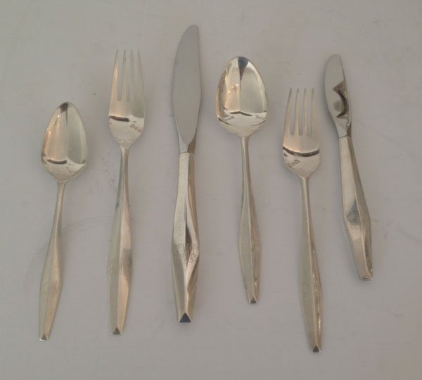 72 Piece Modernist Gio Ponti Reed & Barton Flatware: All the flatware pcs. are monogrammed BWB The weighable silver grosses approx. 88.13 OZT. This lot also includes (12) Dinner Knives and (12) Butter Knives.