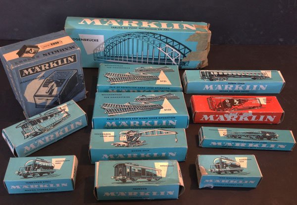Lot Of Vintage Marklin Trains: Marklin transformer 6502 110 volt,5121 (2) pr. of points for hand lever operation, Express coach 4022, American covered truck 4572, low-sided bogie goods truck 4514, crane truck 4611, tank wagon shell