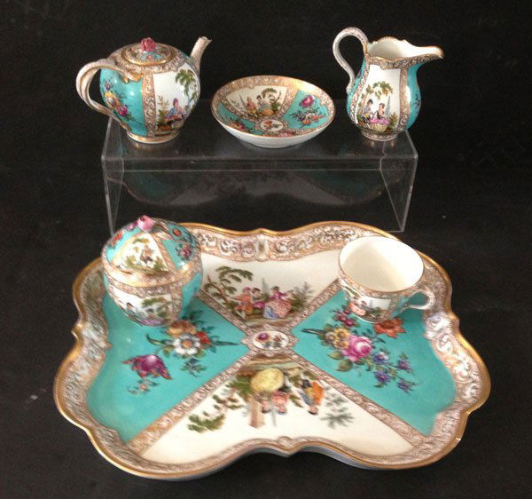 Older Hand Painted Meissen 6 Pc. Breakfast Set: The creamer measures 4(L) x 2 3/8(W)inches. The teacup measures 2 1/2(L) x 3 1/8(W)inches. The saucer measures 5 5/8 in diameter. The sugar dish measures 4 3/8(L) x 3 1/2 in diameter. The teapot measu