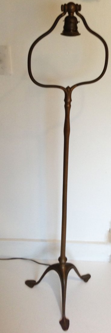 Handsome Signed Tiffany Studios N.Y. Floor Lamp Base: It is hallmarked on the bottom of the base. And it measures from the base to the top of the lamp 55 3/4 (H) inches.