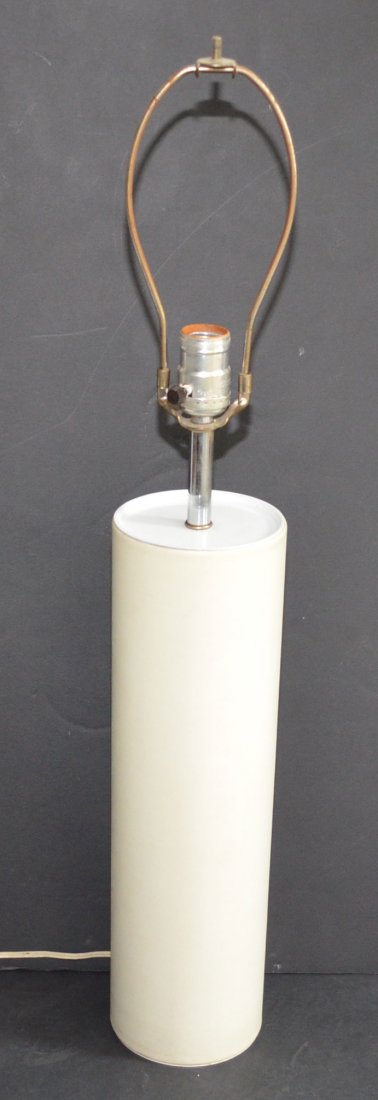 Sleek Kovacs Cyllindrical Cream Leather Lamp: Unsigned Kovacs lamp, leather part measures 16" tall x 4.5" diameter.