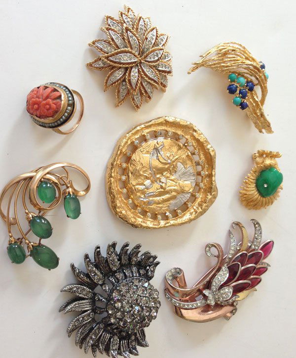 Lot Of 14k and Costume Jewelry Retro Pins: 14k & green stone pin (weighs 6.5 dwt) and a 14k, coral and seed pearl ring (weighs 4.9 dwt and is a size 6). Lot also includes 6 Costume pins: Trifari with red gems, unsigned gun metal and crystal pi