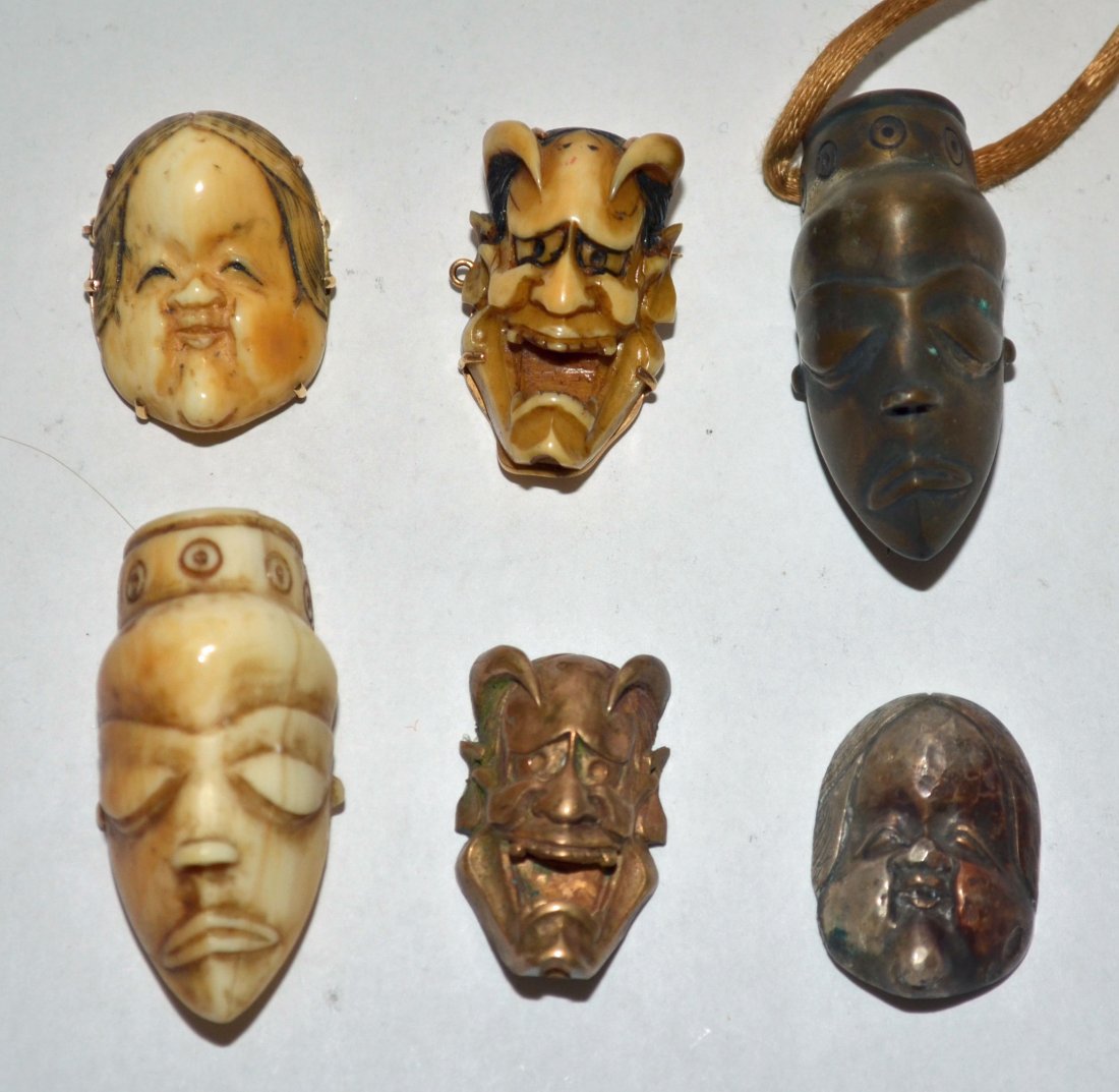 Stunning Vintage Netsuke Carved Pins ( Some Gold ): 2 Ivory Hannaya Masks set in 14k gold, longer (signed one) measures 1.25" long other 1 1/8" long, with matching metal copies. 2 African masks, one ivory and one metal measure 1.75" long.