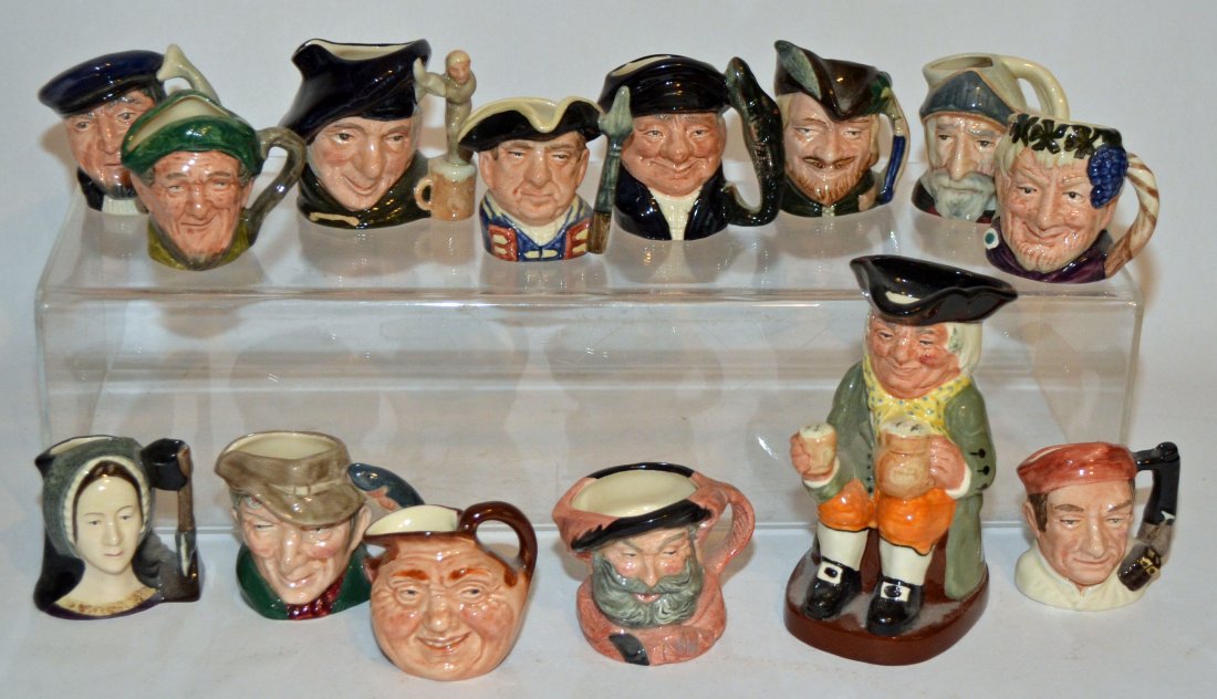 14 Royal Doulton Toby Mugs: Icludes: Lobster Man, Falstaff, Tam O'Shanter, Don Quixote, Anne Boleyn, Jon Barleycorn, Robinhood, Williamsburg Bootmaker, Auld Mac, Capt Ahab, Bacchus, The Poacher, Happy John and Williamsburg Guard