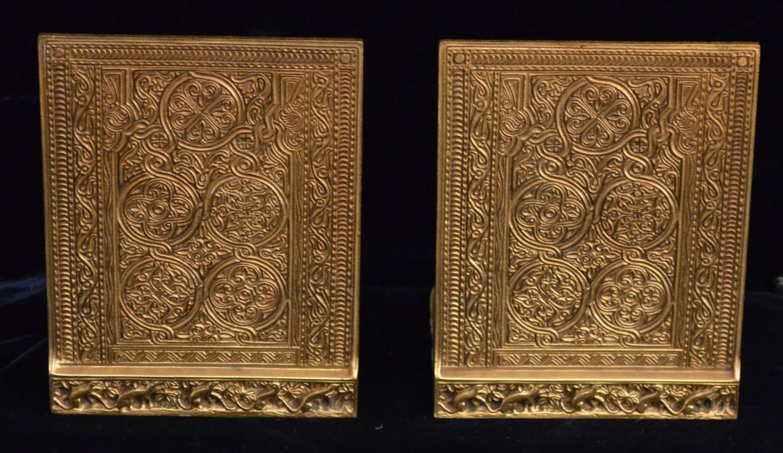 Tiffany Studios New York Bronze Venetian Bookends: Signed Tiffany Studios 1683. They measure 6 1/8" tall x 4.75" wide x 5.25" deep at base.