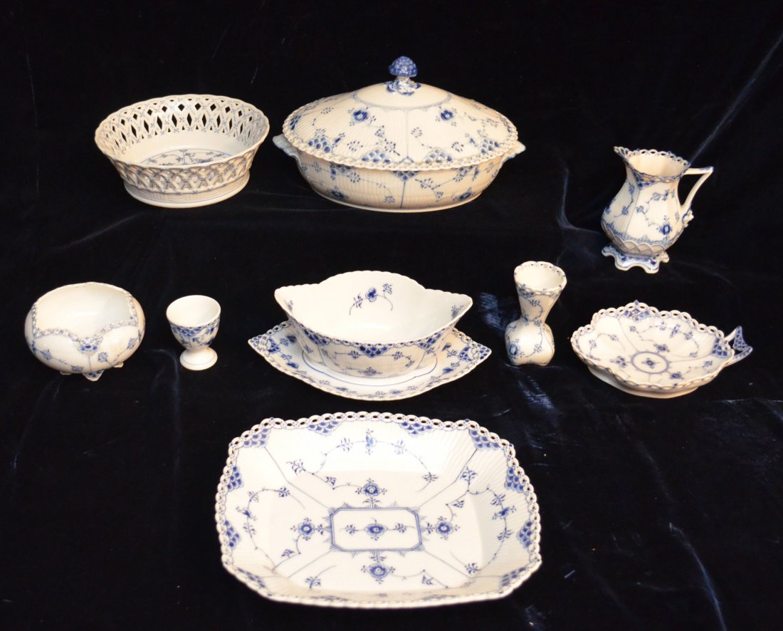 9 Royal Copenhagen Blue Fluted Full Lace Serving Pieces: Lot includes: A covered vegetable bowl #1129 (5.5" tall x 10"l x 7.75" wide), bud vase #1162 (4" tall), egg cup #542 (2.25"t x 2" diameter at top), bouquet holder/vase #1044 (2.75" tall x 3.25" across