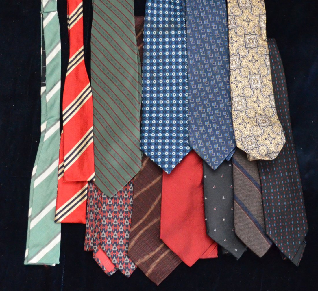 Collection of Designer Ties: Lot includes: 3 Hermes, Issey Miyake, 2 Givenchy, Gucci, Yves St. Laurent, Versace, and Brooks Brothers tie and 2 BB bowties.