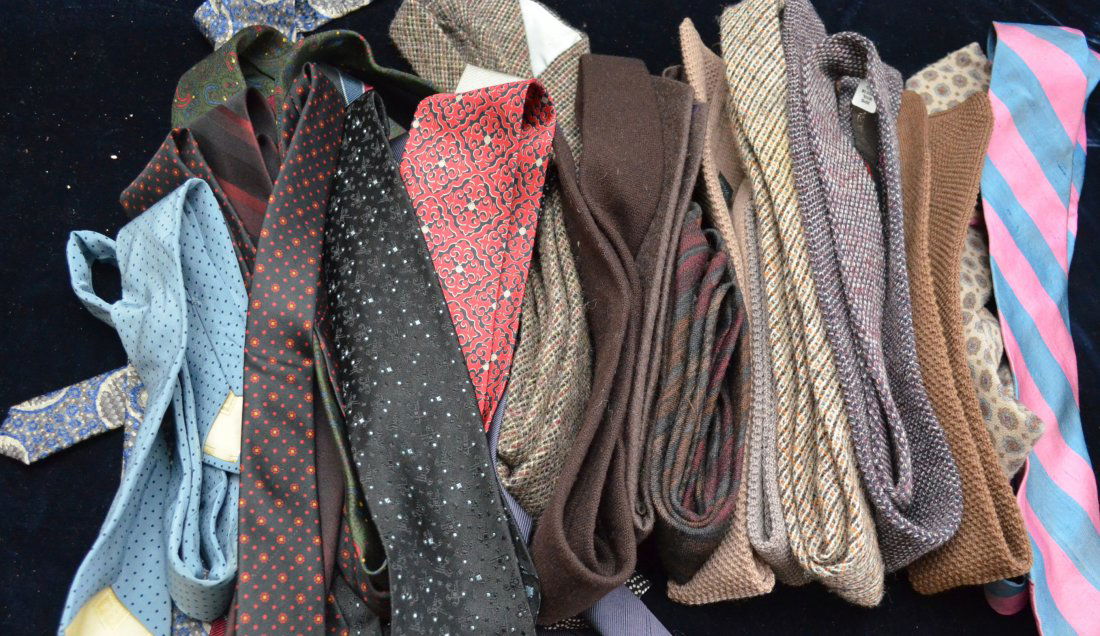 Large Collection of Name Brand/Designer Ties: Approximately 101 ties including: Calvin Klein, Ralph Lauren, Barneys and so on.