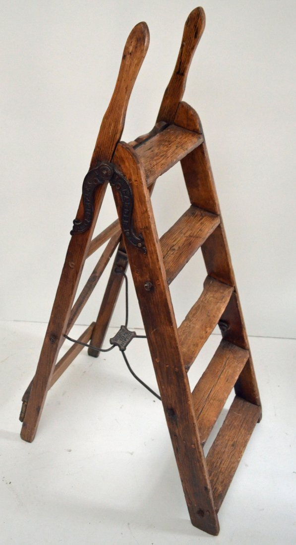 Antique Wooden Library Ladder: This ladder measures 62 1/4" (H) x 19 1/4" (W) x 30 1/4" (D).