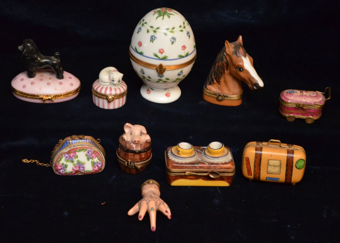 Fantastic Lot of Limoges Porcelain Boxes: Lot includes: Reynaud Limoges egg box (3.75"t), Rochard Limoges Horse head (3" tall), Limoges kitten (1.5"t), Artoria Limoges poodle dog (2.75"t), pig in a barrel (2.25"t), figural hand (2.5"l), Purse