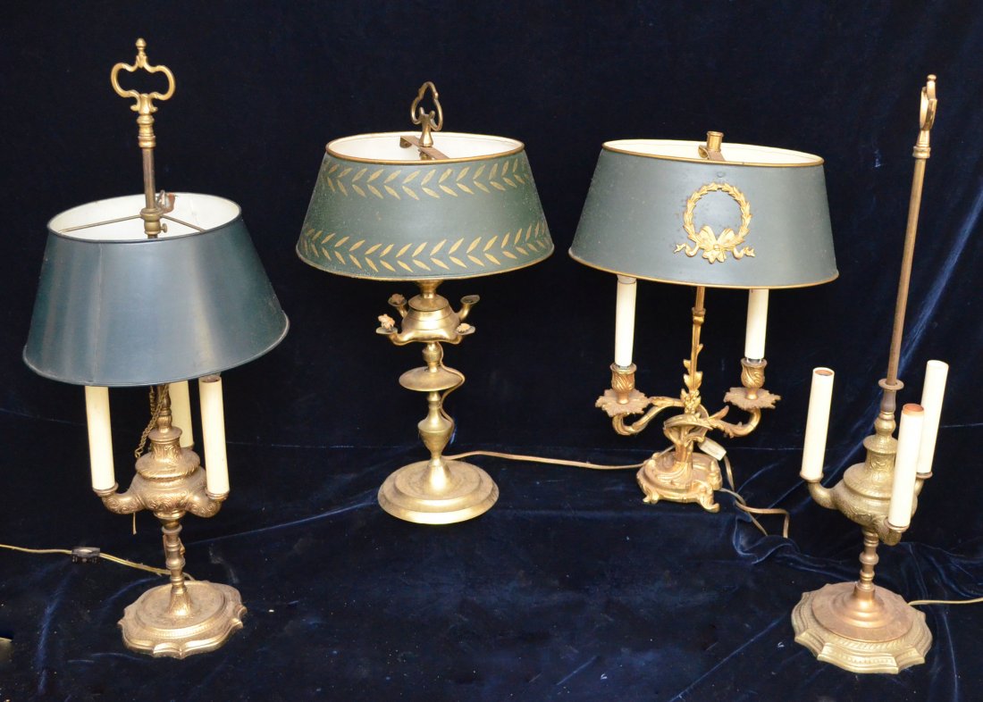 Collection of Lamps: Collection of 4 brass lamps, three with tole shades. Range from 25.5" tall to 17.25" tall.
