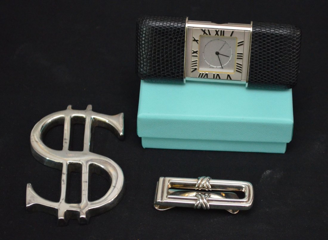 Tiffany & Co Money Clip & Atlas Travel Clock: Lot Includes: Tiffany Atlas alarm clock in black leather case "Travel alarm clock with quartz resonator in rhodium with pink leather slide cover. Swiss-made, 1.5" high", Tiffany & Co Signature money c
