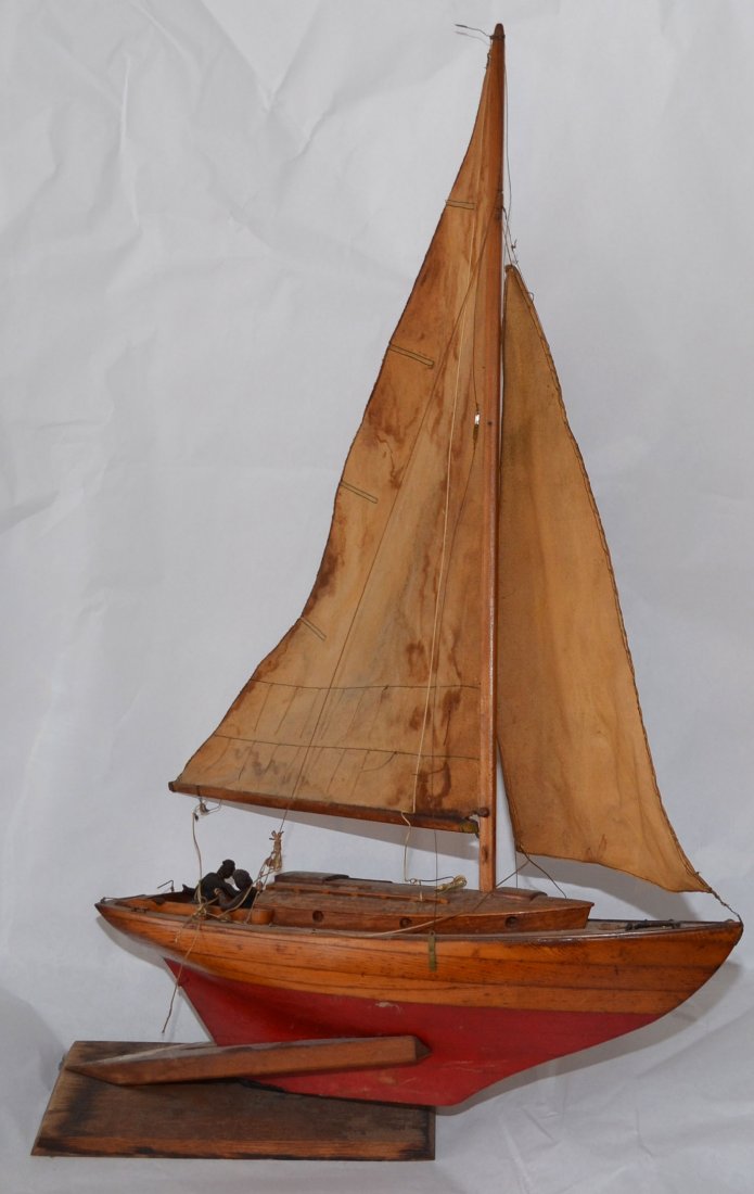 Antique Wooden Model Sail Boat: Measures 34" tall (on stand) x 21"long x 7" wide
