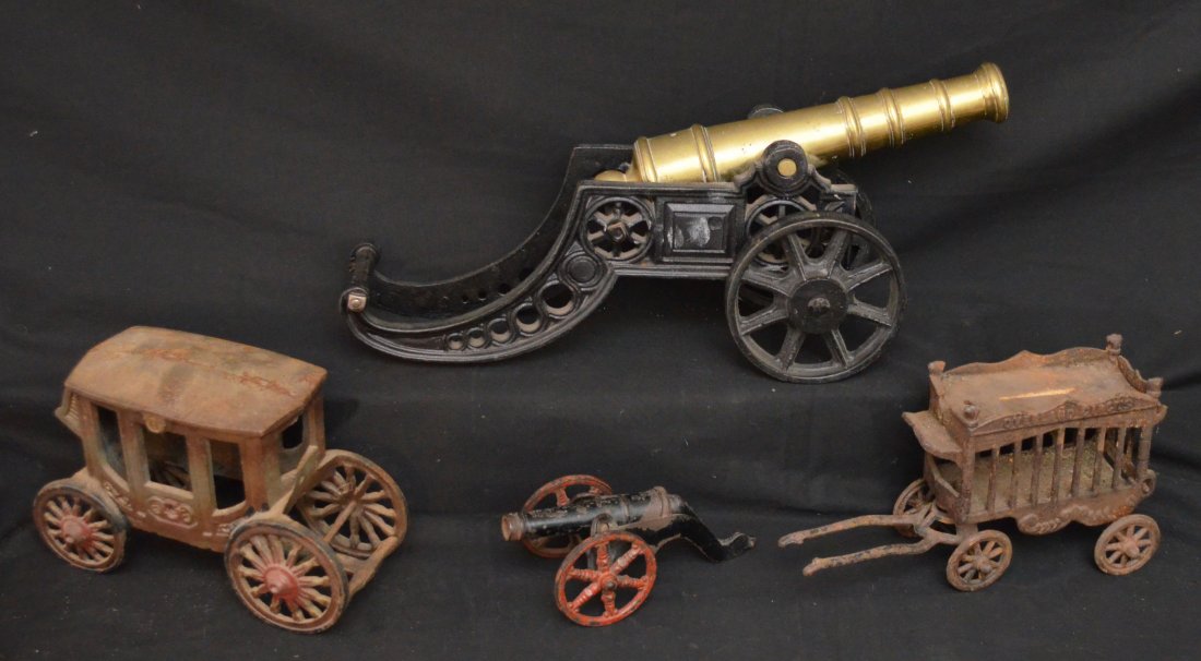 Vintage Cast Iron Toys Including a Canon: Lot includes: Large brass cannon on cast iron base (18.5" long x 8.25" tall x 5" wide), Overland circus cage (10" long x 5.5" tall x 4" wide), larger wagon 9" long x 5.75" tall x 4" wide) and a small 
