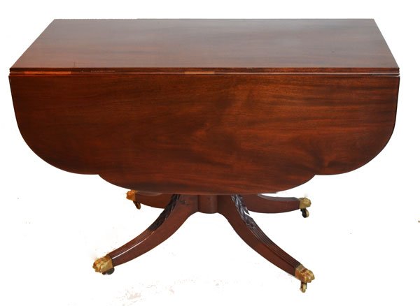 Antique Mahogany Drop-Leaf Breakfast Table: A little Regency, a little Duncan Phyfe style drop leaf table. Measures 29" tall x 41.5" wide x 48.5" across the top open (18.5" closed).