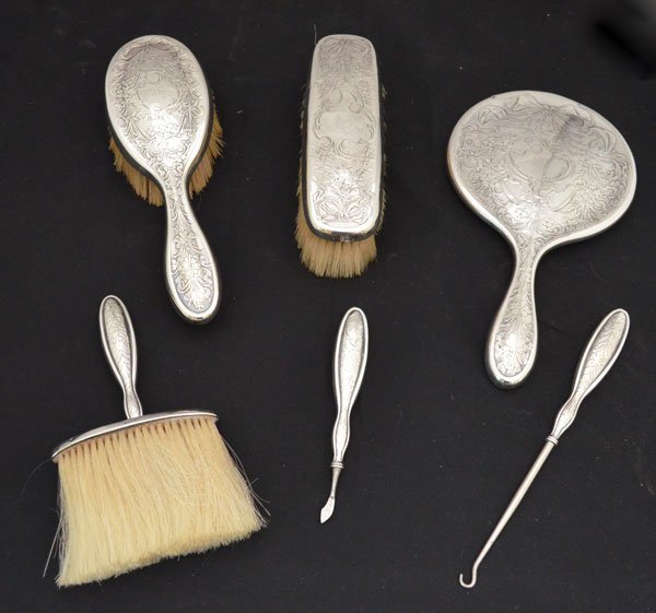 Vintage La Pierre Sterling Silver Dresser Set: Lot includes: hand mirror (9 7/8"), Hair brush (9.25"), hand brush (7"), cuticle pusher (5.5"), crotchet hook (8.25"), and a table brush (7")