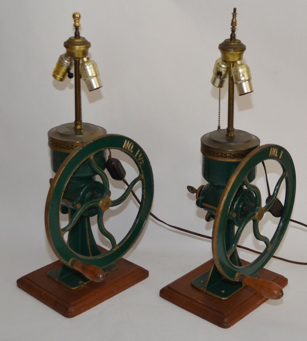 Pr Antique Coffee Grinder Lamps: One is a #1 and the other is a 1 1/2. Lamps measure 25" tall to top of finial. Grinder alone measures 13.5" tall with a 12" diameter wheel. Base measures 8" x 10".