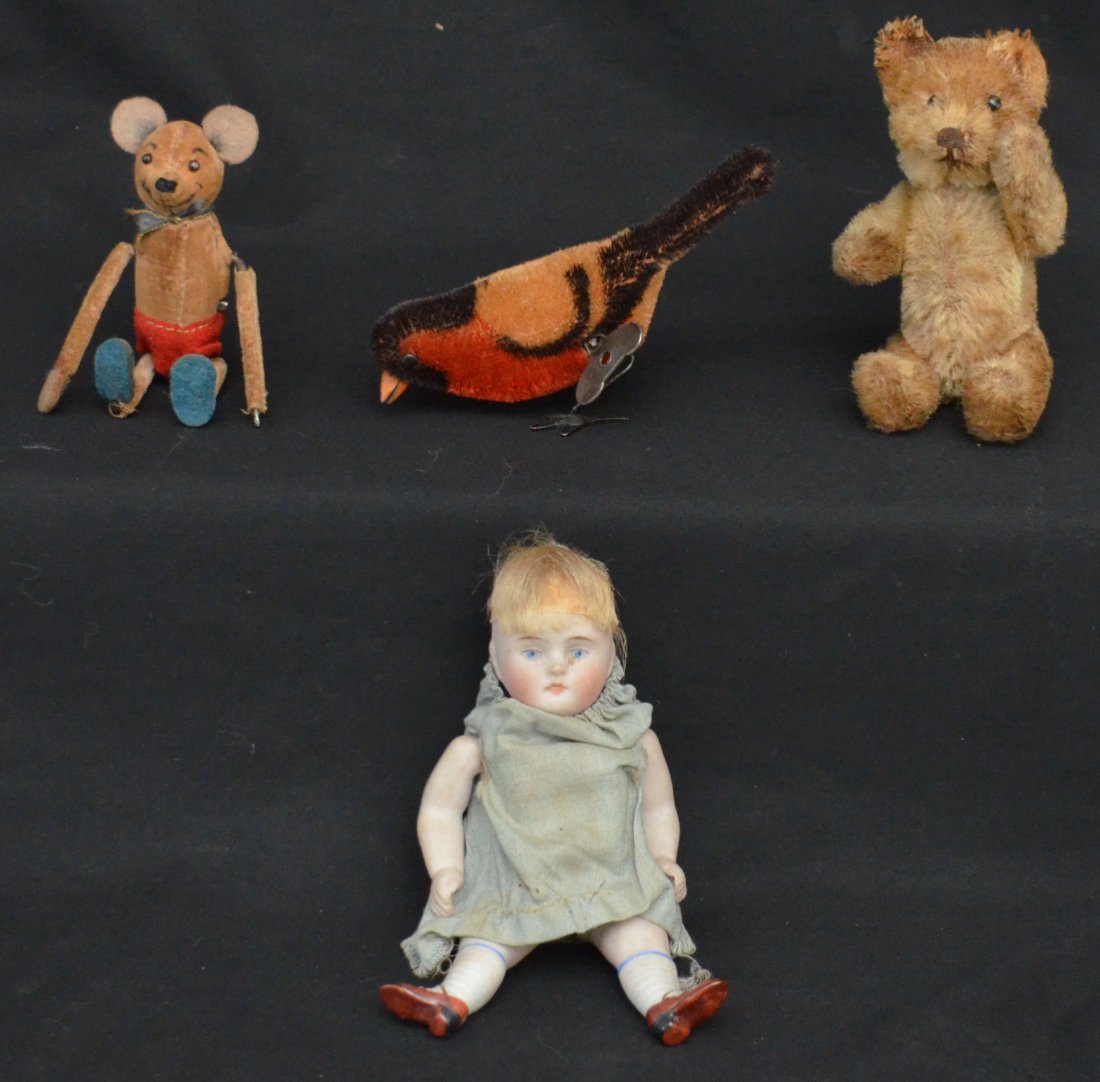 Lot of 3 Mohair Wind-Up Toys & a Bisque Head Doll: Lot includes: wind up bear with cloth outer (4" tall), Steiff? Mohair bear (4.5" tall ), mohair wind up bird (4.75" long x 2.5" tall), doll with bisque head (4.5" tall).