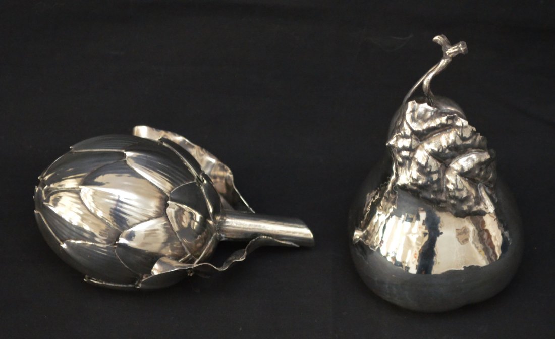 2 Stunning Buccellati Sterling Silver Lighters: Lot includes a sterling Mario Buccellati artichoke lighter (3" tall x 5.75" long x 4" wide) and a pear lighter (5.75" tall x 3.25" wide at widest part). Gross weight of the two pieces is 13.13ozt.