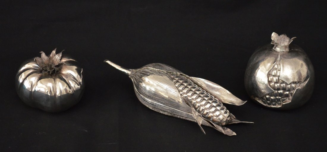 Wonderful Lot of Buccellati Sterling Fruits/Vegetables: Lot includes: Pomegranate (3.5" tall x 3.25" diameter), tomato (2.5" tall x 3" diameter) and an ear of corn (7.75" long x 2 3/8" wide x 2.25" tall). Corn is signed Mario Buccellati, pomegranate signed