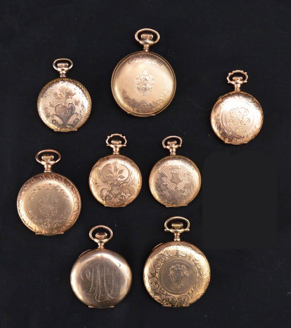 8 Ladies Gold Filled Hunter's Case Pocket Watches: Lot includes: 4 Waltham (from 1 5/8" diameter to 1 3/8"), Traub Bros & Co (1.75" diameter), New York Standard Watch Co (1 5/8"), Madison (1 5/8") and Thomas Morrow (1 3/8").