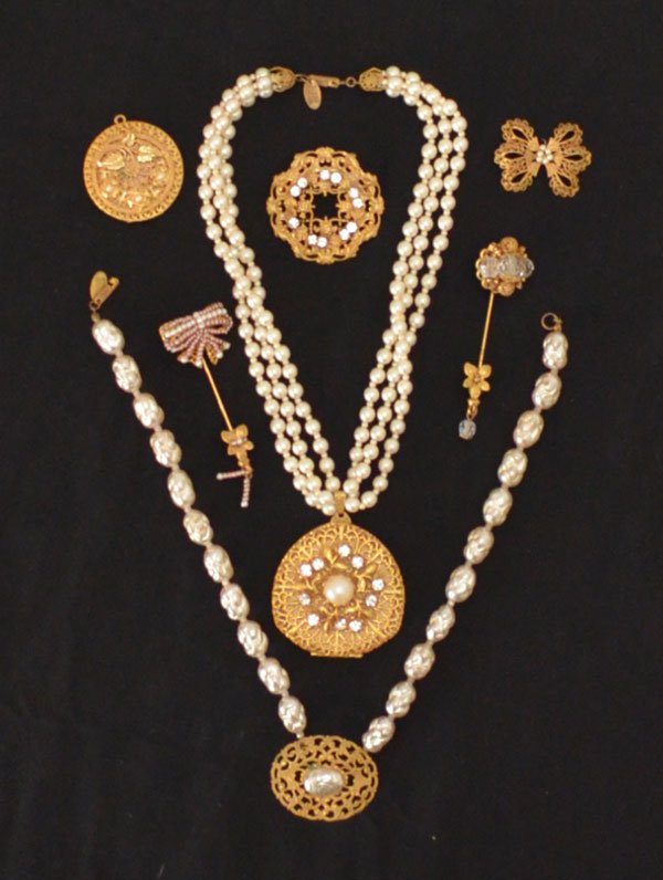 Lot of Vintage Miriam Haskell Necklaces & Pins: Lot includes: rhinestone pin (1.75" diameter), larger sized faux pearl necklace (16 1/8" long), 3 strand faux pearl necklace with gold tone locket (15.75" long w 2.25" drop), Stick pin (not signed 2.7