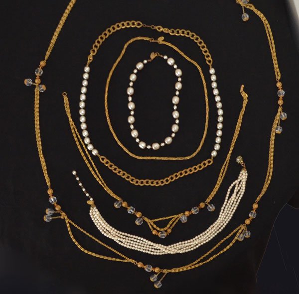 Lot of Miriam Haskell Necklaces: Lot includes: larger size faux pearls (15.5"), cut crystal necklace (58.5"), faux pearl and chain link necklace (31.5"), freshwater pearl 5 strand necklace (17.75"), braided chain (24.25"), and a smal