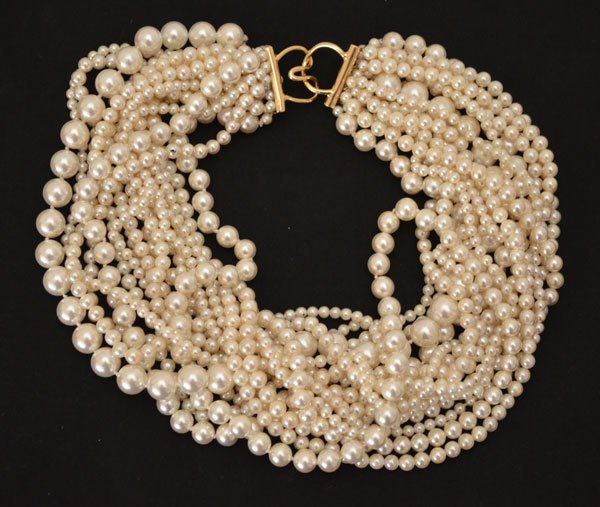 Andrew Clunn 17 Strand Pearl Necklace: 17" long 17 strand Andrew Clunn faux pearl necklace with the original receipt.