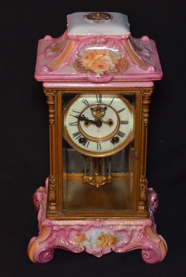 Ansonia Crystal Regulator Porcelain Clock: The clock measures 15.5" tall x 8.75" x 7.75" at the base. Does not have the top finial, the pendulum looks like mercury, but is not.
