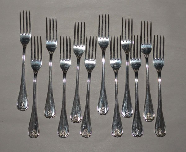 12 Buccellati Laura Sterling Silver Forks: 12 "W" monogrammed sterling silver 7" dinner forks. Gross weight is 18.85dwt.