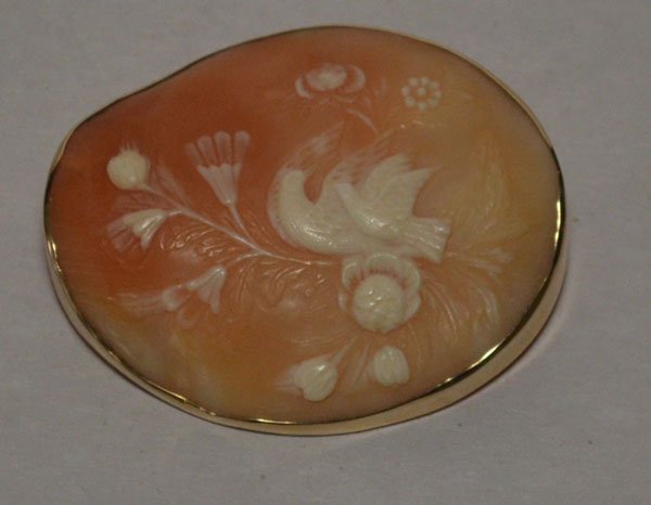 14k Gold Flower & Bird Carved Cameo: Stunning carved shell cameo with turtle doves and floral design set in 14k gold. The brooch measures 2 1/8" x 1.75"