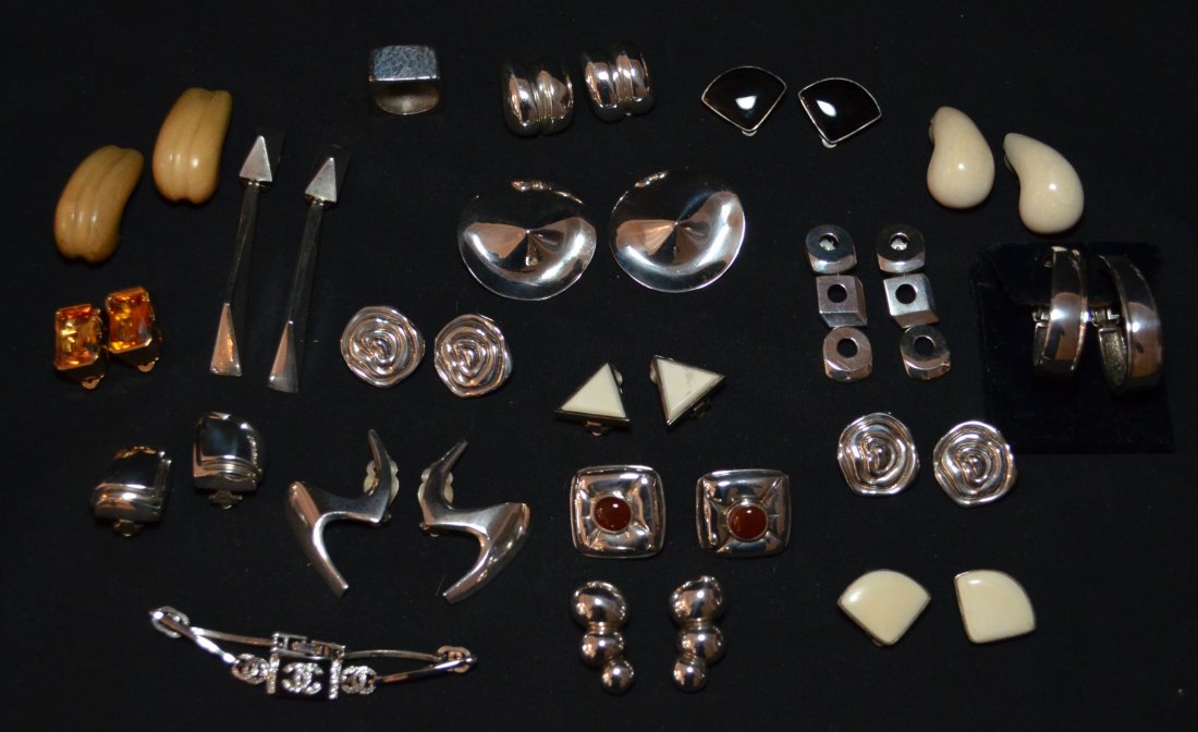 Polly Bergen Designed Jewelry & Additions: 15 pairs of sterling earrings (2 gold wash with cirtine color stone), a ring, 2 pairs of PB design earrings (bone & wood), and a Chanel bracelet. Earrings include bone, carnelian and onyx. Most if not