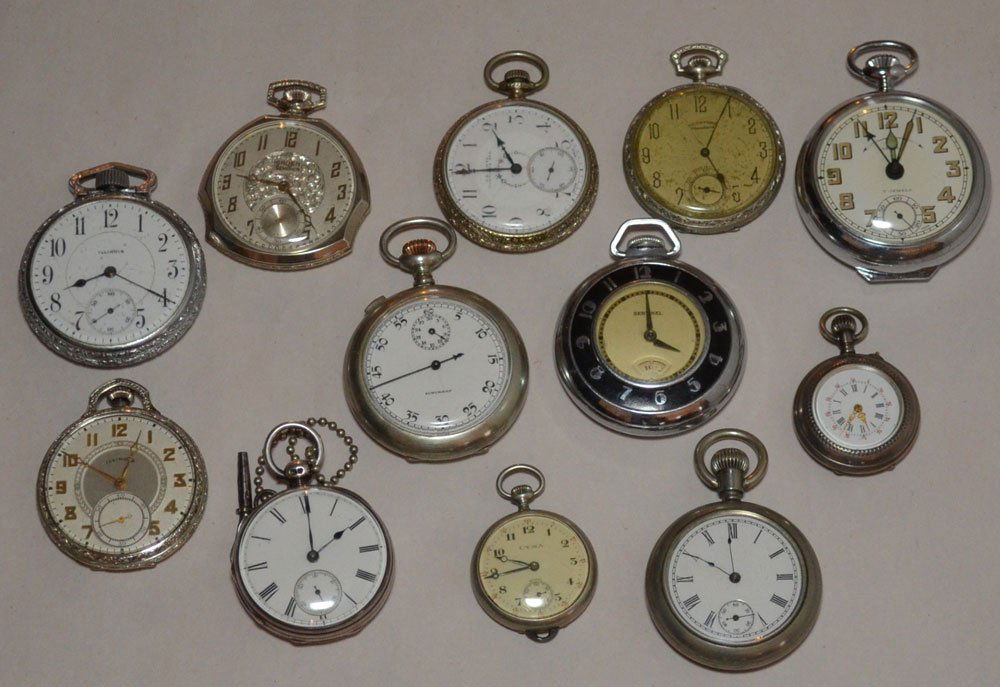 Lot of 12 Vintage Silver Pocket Watches: Lot Includes: Sentinel (2"), Apollo (2"), No Maker-English Silver (1.5"), Rugby (1.75"), Gruen Semithin (1.75"), Cyma (1.25"), Illinois (1.75"), No Maker (1.25"), Suburban (1 7/8"), J.H. Riffe Hasting