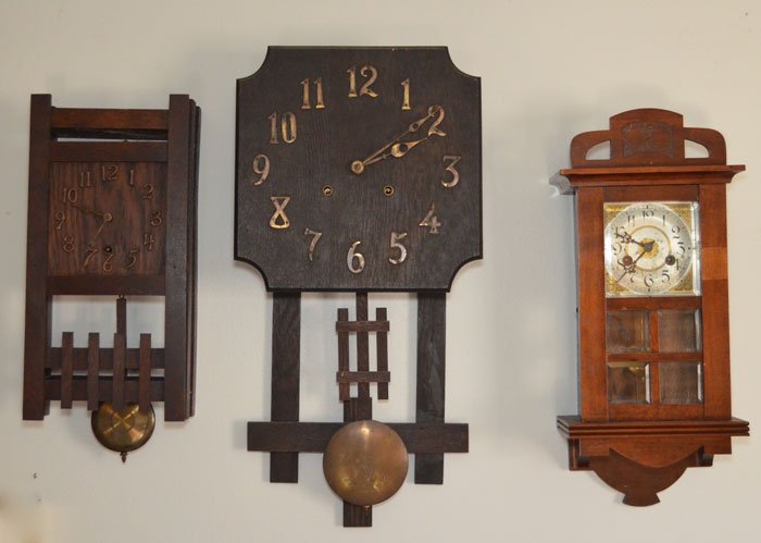 Lot of Three Mission Style Clocks: The Sessions Clock: 17" tall x 8.25" x 4.25" / National Clock & MFG Co: 25.25"l x 13"w x 4.75"d / 21"t x 9" w x 5"d