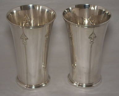 Pr of Art Nouveau Sterling Silver Cocktail Mixers: 2 Stone Associates sterling beakers. They measure 6" tall x 4 7/8" diameter at the top. The gross weight is 20.87 ozt