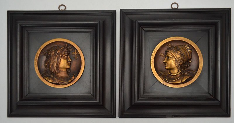 Two Bronze Figural Portrait Paul Sormani Wall Plaques: 2 plaques featuring Agnes Sorel and Charles VII, both are signed Sormani Paris. The frames measure 10.25" x 4 7/8" diameter.