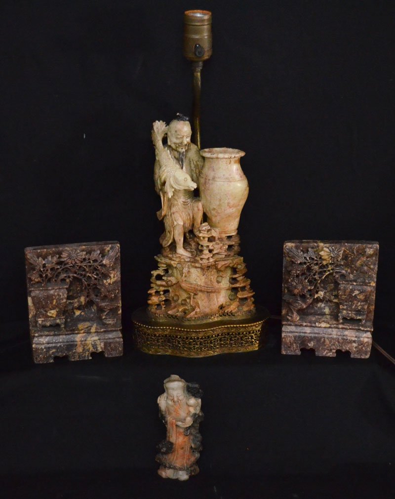 Lot of Carved Soapstone Pieces: Lot includes: a fisherman with a fish lamp (16" tall), pair of bookends (4.5" x 5.5") and a wise man statue (5.5" tall).