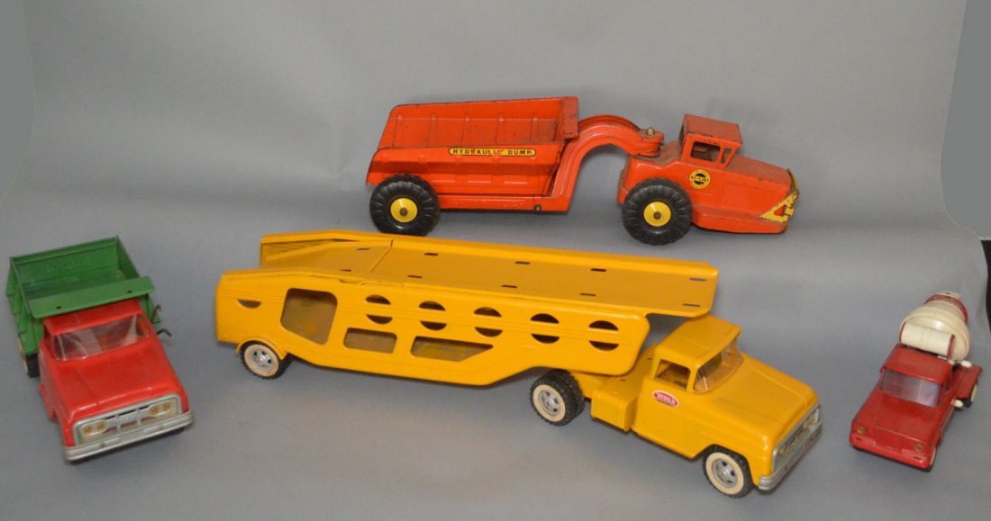 6 Vintage Tonka Toy Trucks: 2 are NY-Lint and the rest are Tonka. They range from 5"t x 9.5"l to 32"t (ladder) x 18.5" long.