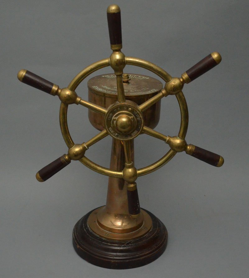 John Hastie Brass & Wood Ship's Wheel: It measures 23.25" tall x 15.5" wide x 9" deep