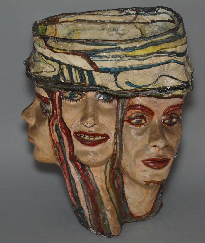 Vintage Plaster 4 Faced Vase / Planter: It measures 15.5" tall x 13" wide x 9" deep. Has some chipping.