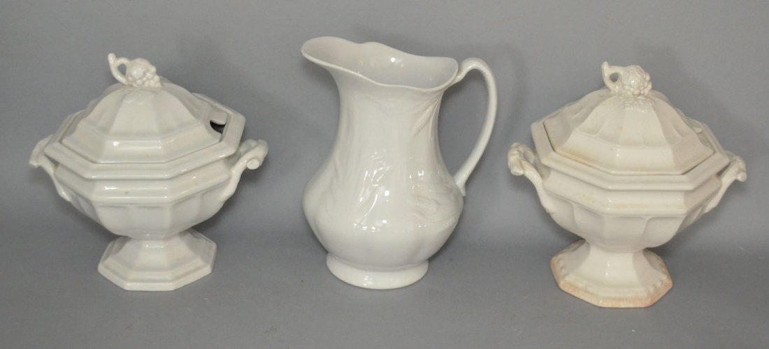 Lot of 2 Ironstone Tureens & a Pitcher: They vary in height from 11.5" to 12" tall. One tureen has yellowing, crazing.